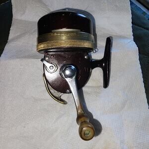 VINTAGE SHAKESPEARE 1777 PUSH BUTTON WONDERCAST FISHING REEL